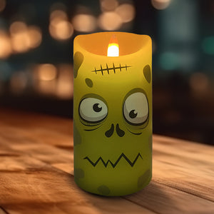 WAX HALLOWEEN LED CANDLE 3 INCH DIA X 6 INCH HIGH | GREEN WITH MONSTER FACE | WITH REMOTE