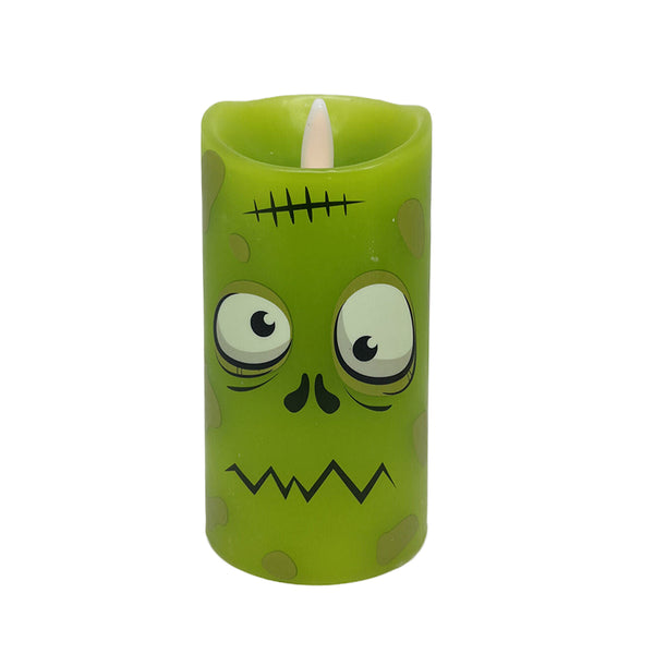 WAX HALLOWEEN LED CANDLE 3 INCH DIA X 6 INCH HIGH | GREEN WITH MONSTER FACE | WITH REMOTE