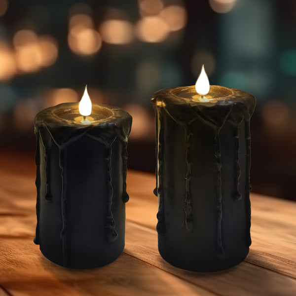 Set of 2 Black Drippy candle with pooled finish. 3in dia x 5in,6in H.